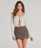 The Toasty Babe Long Sleeve Rib Knit Crop Top in ivory with a modern design and trendy look is part of the latest women's tops collection to elevate your 2025 wardrobe.