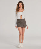 The Toasty Babe Long Sleeve Rib Knit Crop Top is a cozy ivory sweater top crafted from textured knits, perfect for layering in winter outfits or adding warmth to a casual day look.