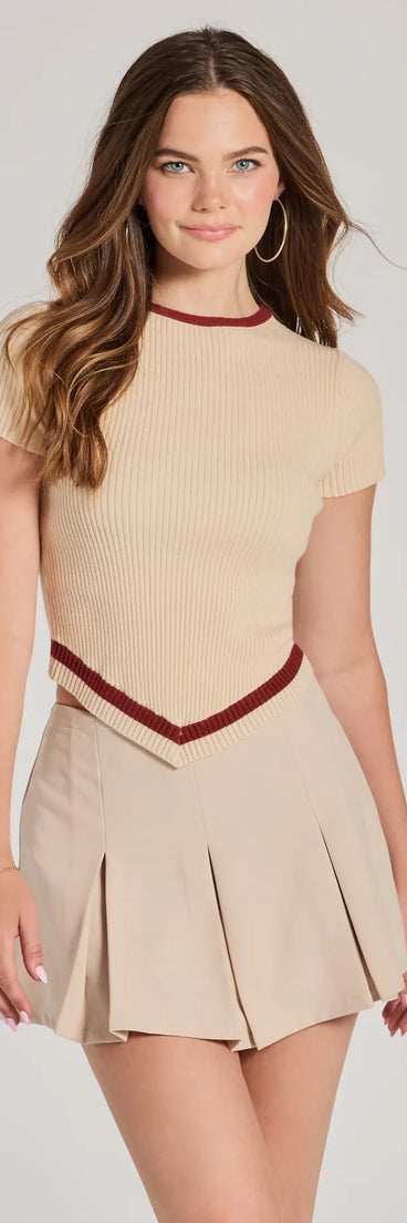 The Preppy Charm Short Sleeve Striped Crop Top is a cozy natural sweater top crafted from textured knits, perfect for layering in winter outfits or adding warmth to a casual day look.
