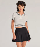 The Cute Status Striped Polo Crop Top in ivory with a modern design and trendy look is part of the latest women's tops collection to elevate your 2025 wardrobe.