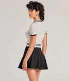 The Cute Status Striped Polo Crop Top is a cozy ivory sweater top crafted from textured knits, perfect for layering in winter outfits or adding warmth to a casual day look.