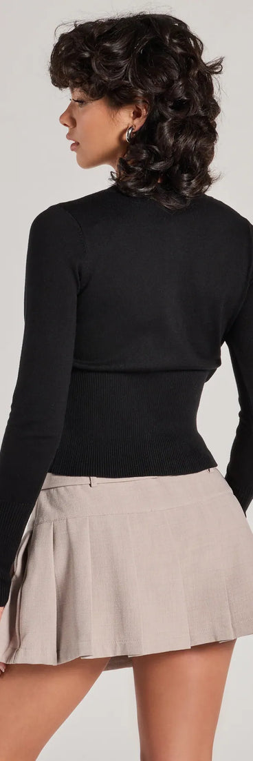 Trendy women’s tops in black, like the Chic Staple Crew Neck Cropped Knit Cardigan, bring effortless style for fall layering, lounging, or going out.