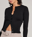 Layer-friendly Chic Staple Crew Neck Cropped Knit Cardigan is a chic, transitional black long-sleeve top with contemporary sleeves and neckline design, ideal for an elevated seasonal style or casual elegance.