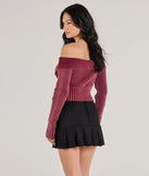 Make a statement this winter with the Trendsetting Style Off-The-Shoulder Cropped Knit Top, a wine long-sleeve top featuring a trendy shoulder design that adds a bold, festive touch to any club or party look.