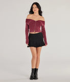 The Trendsetting Style Off-The-Shoulder Cropped Knit Top is a cozy wine sweater top crafted from textured knits, perfect for layering in winter outfits or adding warmth to a casual day look.