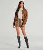 Complete your look with the Winter Slay Turtleneck Long Sleeve Bodysuit, a trendy ivory top that’s ready to pair with anything in your fall rotation.