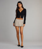 Complete your look with the Cozy Charm Cropped Knit Cardigan, a trendy top that’s ready to pair with anything in your fall rotation.