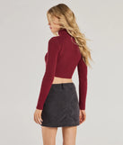 Stand out in 2025 in the Chic Muse Ribbed Knit Cutout Crop Top, a women's burgundy long-sleeve top crafted from an elevated fabric with a modern neckline perfect for party outfits, bridal shower attire, or elevated casual outfits.