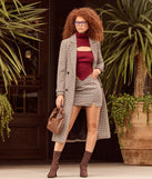 The Chic Muse Ribbed Knit Cutout Crop Top is a cozy sweater top crafted from textured knits, perfect for transitional weather outfits or adding a warm layer to a casual day look.