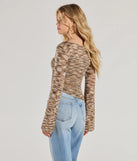The Trendy Impression Asymmetrical Bell Sleeve Knit Top is a women's multi-color long-sleeve top with an elevated style and unique design accents, perfect for layering or transitioning into colder months.