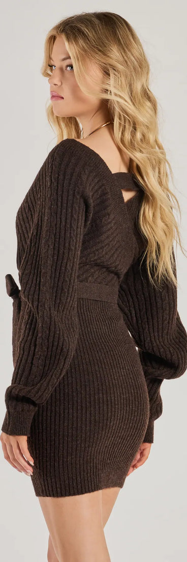 Revamp your 2025 wardrobe with this chic addition, the Cozy Fave Cable Knit Long Sleeve Mini Dress in brown, perfect for elevating your style in the new year.
