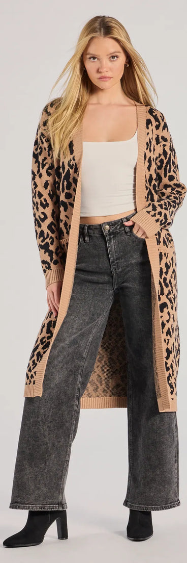 The Fierce Vibes Leopard Print Long Sleeve Knit Duster in leopard print is a women's workwear essential with an elevated fabric and chic silhouette, ideal for layering and versatile enough to take your look from office chic to going-out ready!