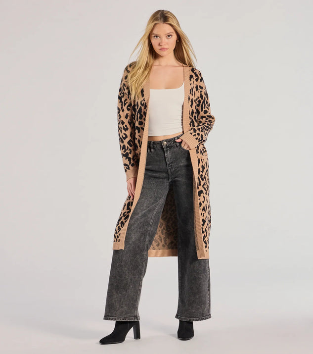 The Fierce Vibes Leopard Print Long Sleeve Knit Duster in leopard print is a women's workwear essential with an elevated fabric and chic silhouette, ideal for layering and versatile enough to take your look from office chic to going-out ready!