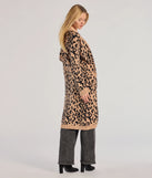 The Fierce Vibes Leopard Print Long Sleeve Knit Duster in leopard print is a women's workwear piece offering a trendy style and unique accents, perfect for effortlessly creating an outfit-of-the-day look that transitions your office look to going-out ready.