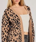 The Fierce Vibes Leopard Print Long Sleeve Knit Duster in leopard print is a women's workwear essential with an elevated fabric and chic silhouette, ideal for layering and versatile enough to take your look from office chic to going-out ready!
