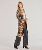 The Fierce Vibes Leopard Print Long Sleeve Knit Duster in leopard print is a women's workwear piece offering a trendy style and unique accents, perfect for effortlessly creating an outfit-of-the-day look that transitions your office look to going-out ready.