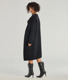 Wrap up in style with the L/S DUSTER (060052103001), a cozy black sweater for women designed for night-out looks, everyday outfits, or as a chic layering piece for the colder months.