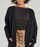 Wrap up in style with the L/S DUSTER (060052103001), a cozy black sweater for women designed for night-out looks, everyday outfits, or as a chic layering piece for the colder months.
