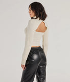 Layer-friendly Cozy Casual Cable Knit Turtleneck Sweater Topper is a chic, transitional ivory long-sleeve top with contemporary sleeves and neckline design, ideal for an elevated cozy style or casual elegance.