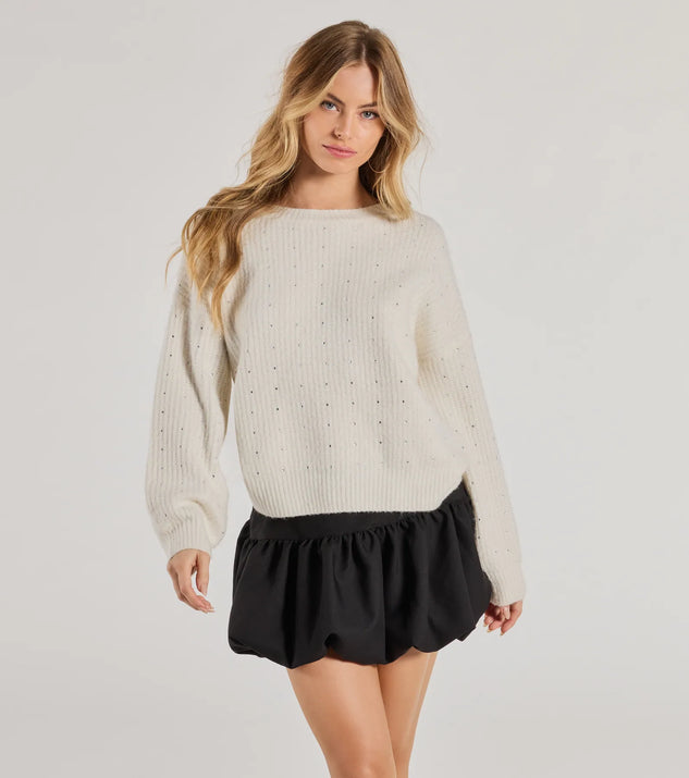 Layer-friendly Cozy Sparkle Rhinestone Ribbed Knit Sweater is a chic, transitional ivory long-sleeve top with contemporary sleeves and neckline design, ideal for an elevated cozy style or casual elegance.