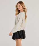 Layer-friendly Cozy Sparkle Rhinestone Ribbed Knit Sweater is a chic, transitional ivory long-sleeve top with contemporary sleeves and neckline design, ideal for an elevated cozy style or casual elegance.