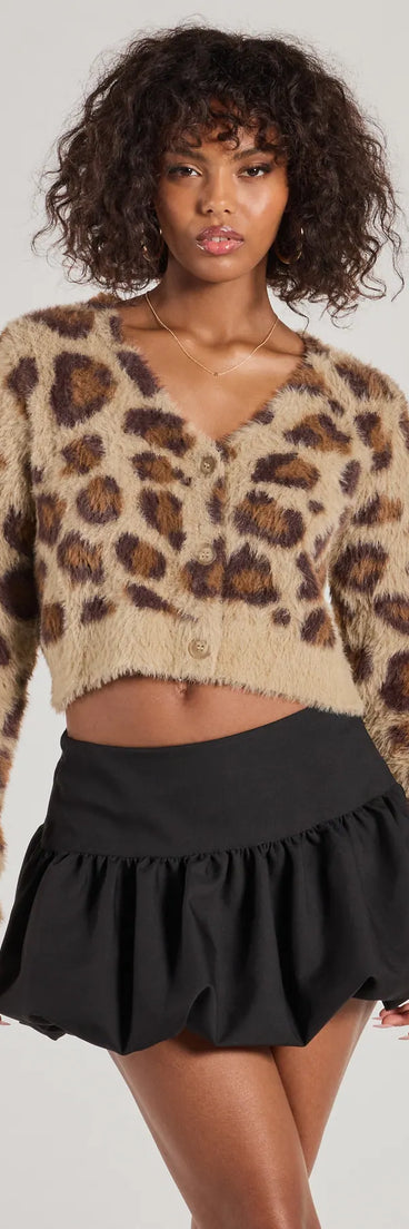 The So Fierce Leopard Print Eyelash Knit Cropped Cardigan in leopard print with a modern design and trendy look is part of the latest women's tops collection to elevate your 2025 wardrobe.