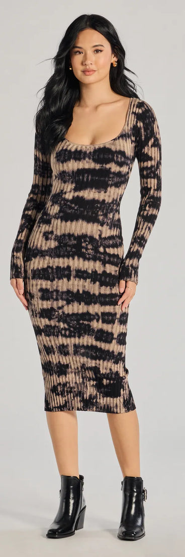 With its mid-calf hem and popular flattering fit, the Cosmic Chic Tie-Dye Knit Midi Dress in black nails the balance of trend and ease, redefining go-to midi dresses for any occasion.