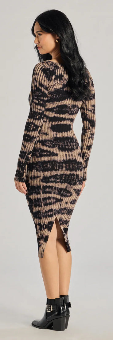 The Cosmic Chic Tie-Dye Knit Midi Dress is a black midi dress, featuring an elevated midi-length silhouette perfect for wedding guest attire, romantic date nights, or effortless everyday styling.