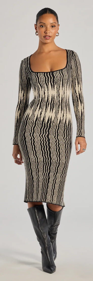 With its mid-calf hem and popular flattering fit, the Trendy Look Abstract Striped Knit Midi Sweater Dress in black nails the balance of trend and ease, redefining go-to midi dresses for any occasion.
