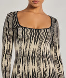 Make a bold statement in the Trendy Look Abstract Striped Knit Midi Sweater Dress in black, the perfect spring dress for weddings, cocktail hours, nights out, and/or seasonal celebrations.