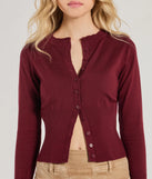Add a sleek touch to your outfit with this burgundy long sleeve top—the Chic Staple Crew Neck Cropped Knit Cardigan makes effortless transitions from desk to dinner.
