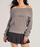 Make a statement this winter with the Cozy Factor Ribbed Knit Off-The-Shoulder Sweater, a charcoal gray long-sleeve top featuring a trendy shoulder design that adds a bold, festive touch to any club or party look.