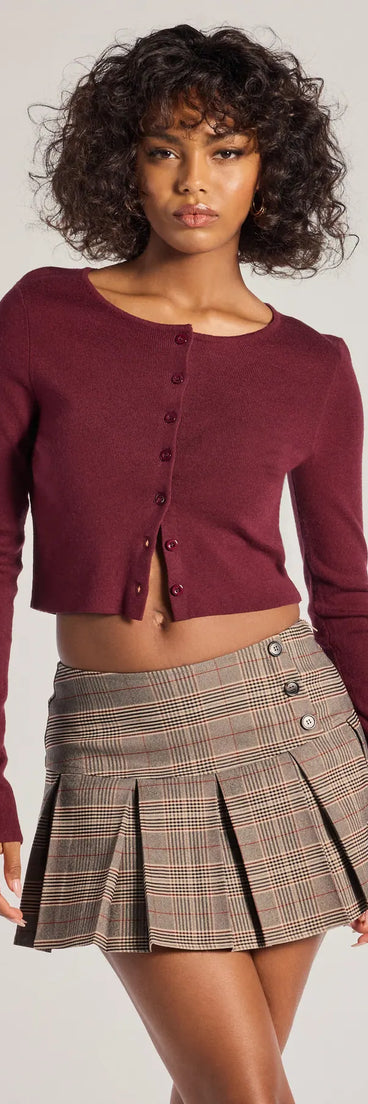 The Cozy Charm Cropped Knit Cardigan in burgundy with a modern design and trendy look is part of the latest women's tops collection to elevate your 2025 wardrobe.
