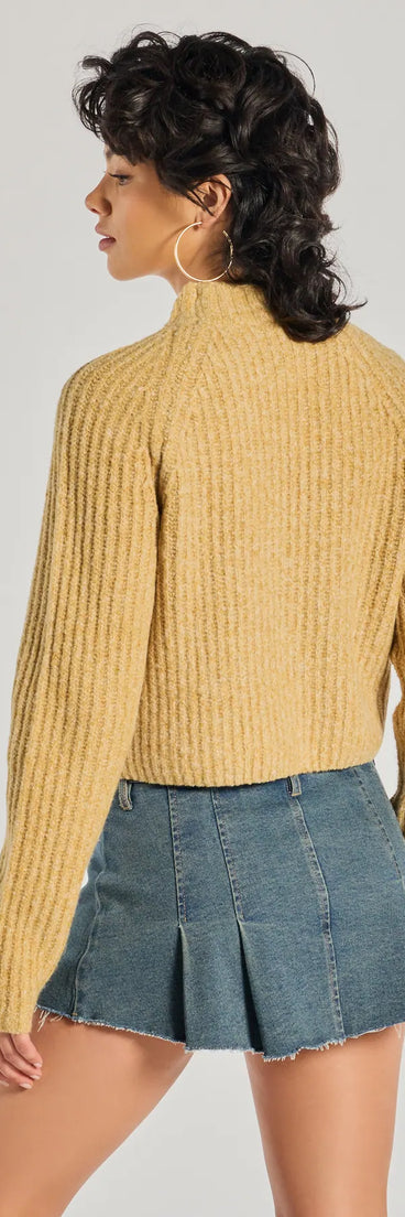 With its midriff cut and trend-forward fit, the Stylishly Casual Mock Neck Knit Sweater is a mustard yellow crop top made to pair with skirts, denim, or whatever vibe you're feeling this season.