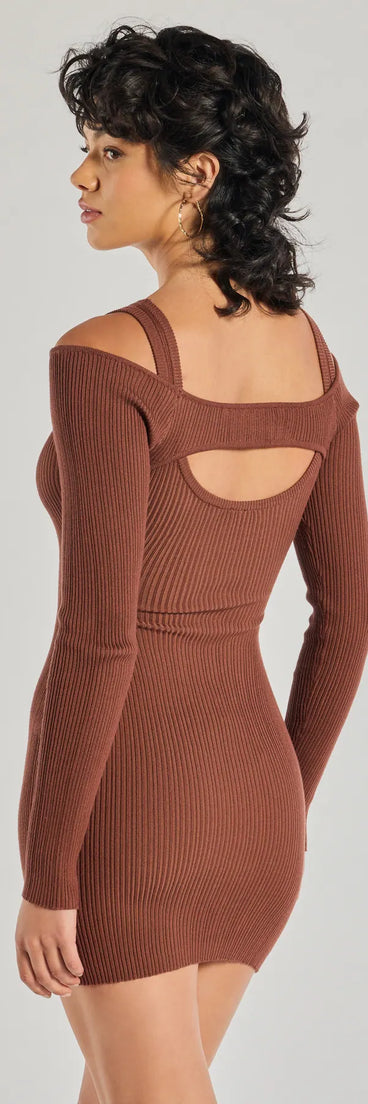 Revamp your 2025 wardrobe with this chic addition, the Effortless Vibe Ribbed Knit Long Sleeve Mini Dress in brown, perfect for elevating your style in the new year.