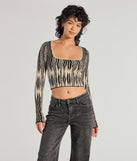 The Bold Chic Abstract Striped Knit Long Sleeve Top in black with a modern design and trendy look is part of the latest women's tops collection to elevate your 2025 wardrobe.