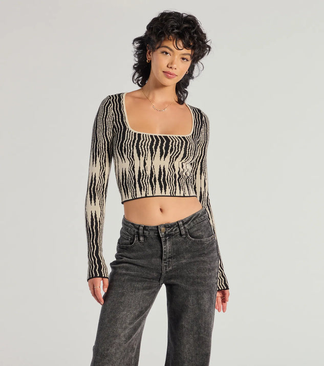 The Bold Chic Abstract Striped Knit Long Sleeve Top in black with a modern design and trendy look is part of the latest women's tops collection to elevate your 2025 wardrobe.