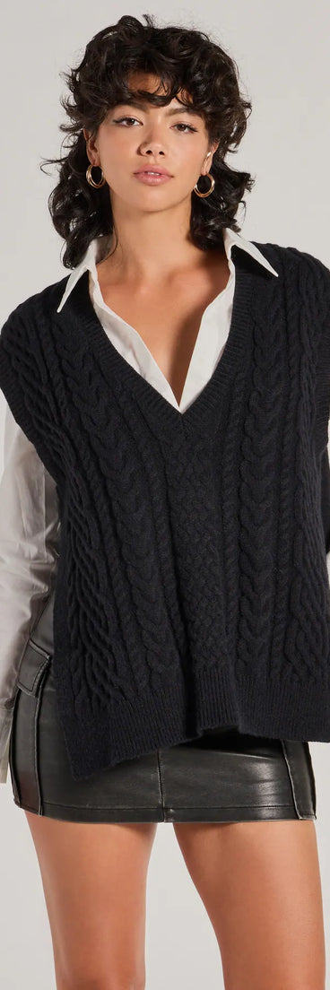 Wrap up in style with the Chic Girl Vibe Cable Knit Vest, a cozy black sweater for women designed for night-out looks, everyday outfits, or as a chic layering piece for the colder months.