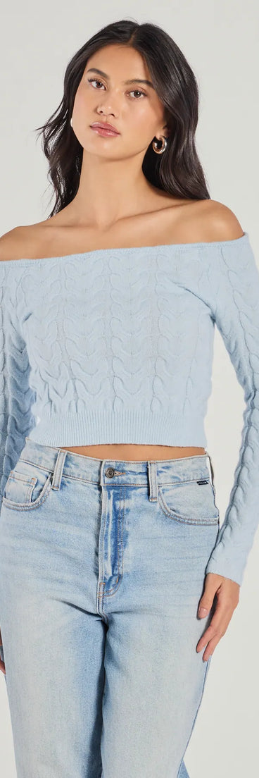 The Cozy Cutie Off-The-Shoulder Cable Knit Top in light blue with a modern design and trendy look is part of the latest women's tops collection to elevate your 2025 wardrobe.