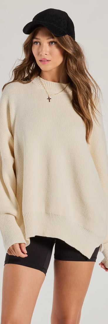 Wrap up in style with the Cozy Style Ribbed Knit Oversized Sweater, a cozy  sweater for women designed for night-out looks, everyday outfits, or as a chic layering piece for the colder months.