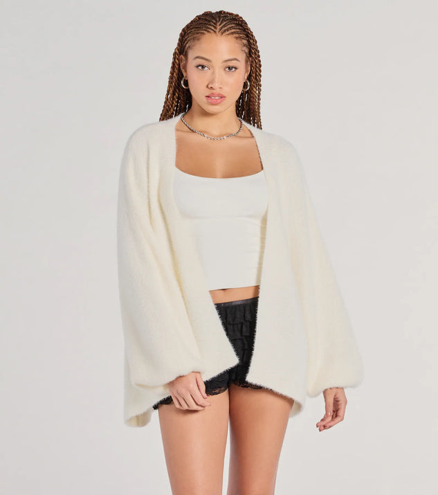 The Cuddle Weather Eyelash Knit Cardigan in ivory with a modern design and trendy look is part of the latest women's tops collection to elevate your 2025 wardrobe.