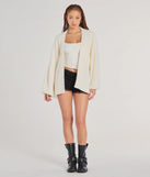 The Cuddle Weather Eyelash Knit Cardigan in ivory with a modern design and trendy look is part of the latest women's tops collection to elevate your 2025 wardrobe.