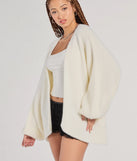 The Cuddle Weather Eyelash Knit Cardigan in ivory with a modern design and trendy look is part of the latest women's tops collection to elevate your 2025 wardrobe.