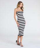 With its mid-calf hem and popular flattering fit, the Chic Charm Striped Knit Strapless Midi Dress in black nails the balance of trend and ease, redefining go-to midi dresses for any occasion.