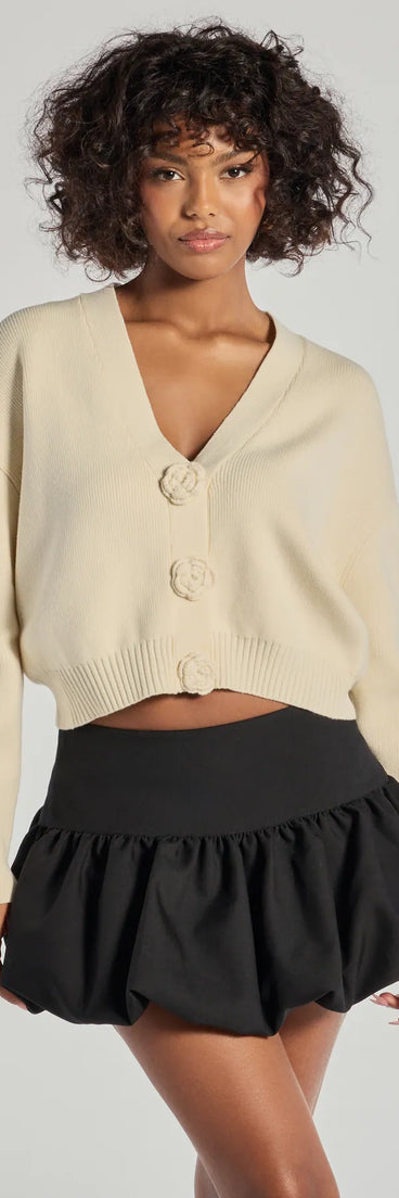 The Floral Charm Cropped Cardigan Knit Sweater in ivory with a modern design and trendy look is part of the latest women's tops collection to elevate your 2025 wardrobe.