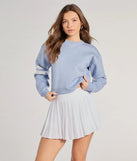 The Varsity Girl Striped Knit Crop Sweater in light blue with a modern design and trendy look is part of the latest women's tops collection to elevate your 2025 wardrobe.