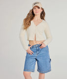 The Adorably Cozy Eyelash Knit Button-Down Cardigan in ivory with a modern design and trendy look is part of the latest women's tops collection to elevate your 2025 wardrobe.