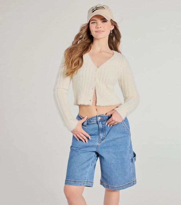 The Adorably Cozy Eyelash Knit Button-Down Cardigan in ivory with a modern design and trendy look is part of the latest women's tops collection to elevate your 2025 wardrobe.