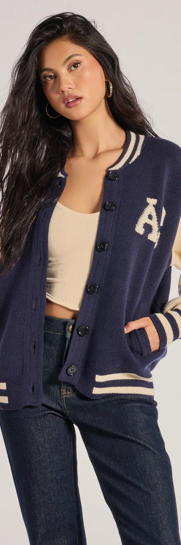 
Upgrade your style game for 2025 with the Varsity Chic Button-Down Sweater Jacket in navy, perfect for any fashion-forward wardrobe.