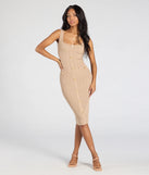 With its mid-calf hem and popular flattering fit, the Sweetest Poise Button Bodycon Midi Dress in taupe nails the balance of trend and ease, redefining go-to midi dresses for any occasion.